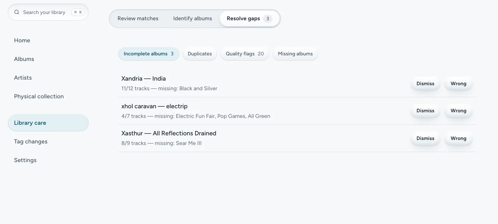 The Library care page listing incomplete albums, each with the number of tracks present and the titles of the missing ones.